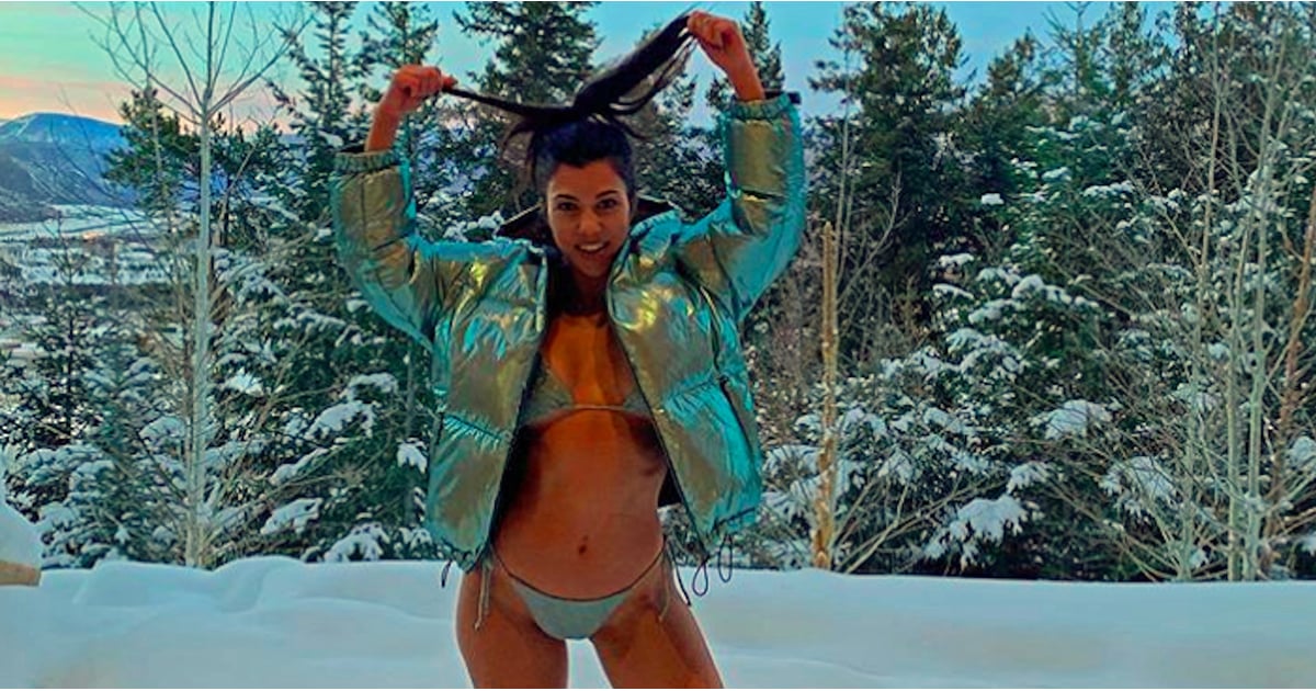 Kourtney Kardashian Silver Bikini and also Bomber in the Snow